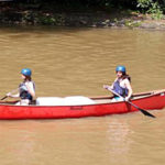 Girl Camp lake canoe activity