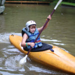 Girl beginner kayaking