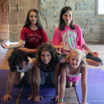 Yoga pose of girls in pyramid
