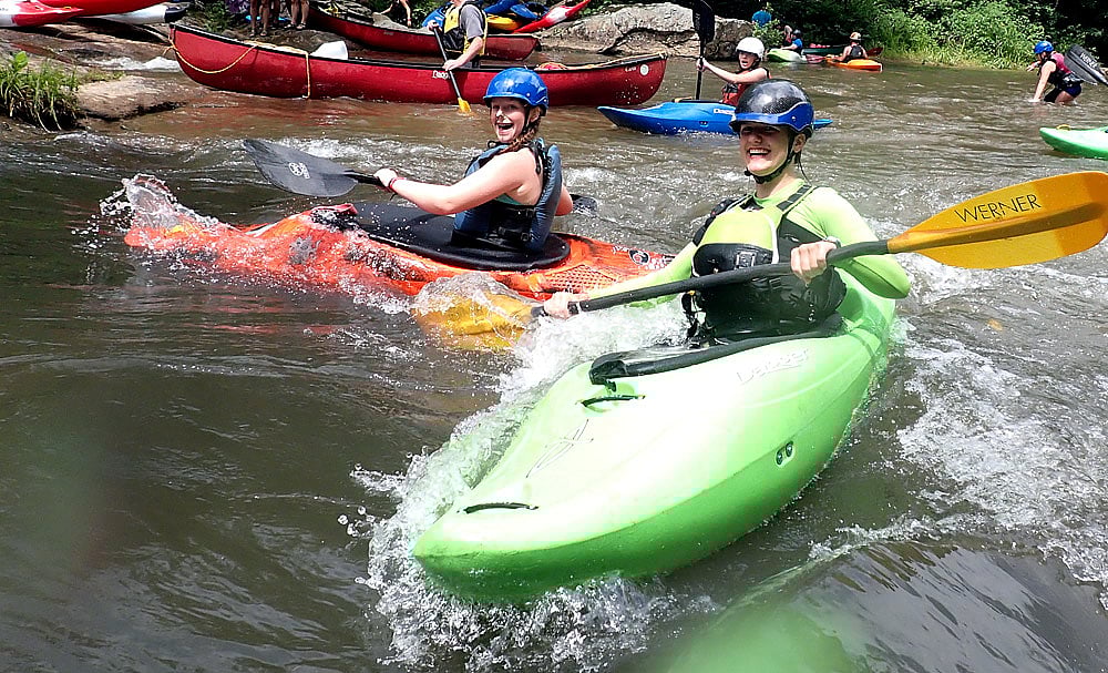 Kayaking surfing whitewater wave