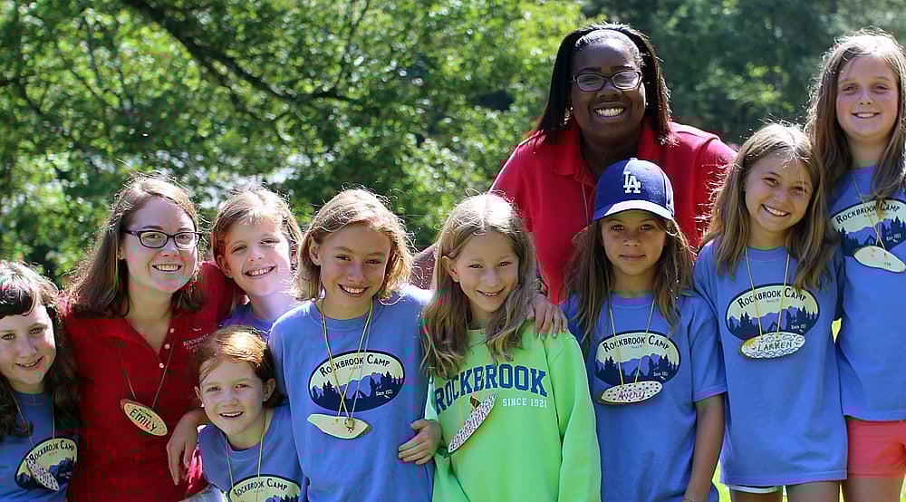 Girls arrive at summer camp