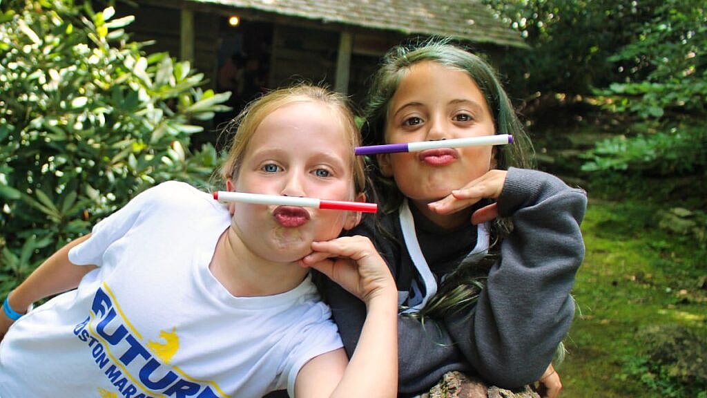 two camp girls goofing around