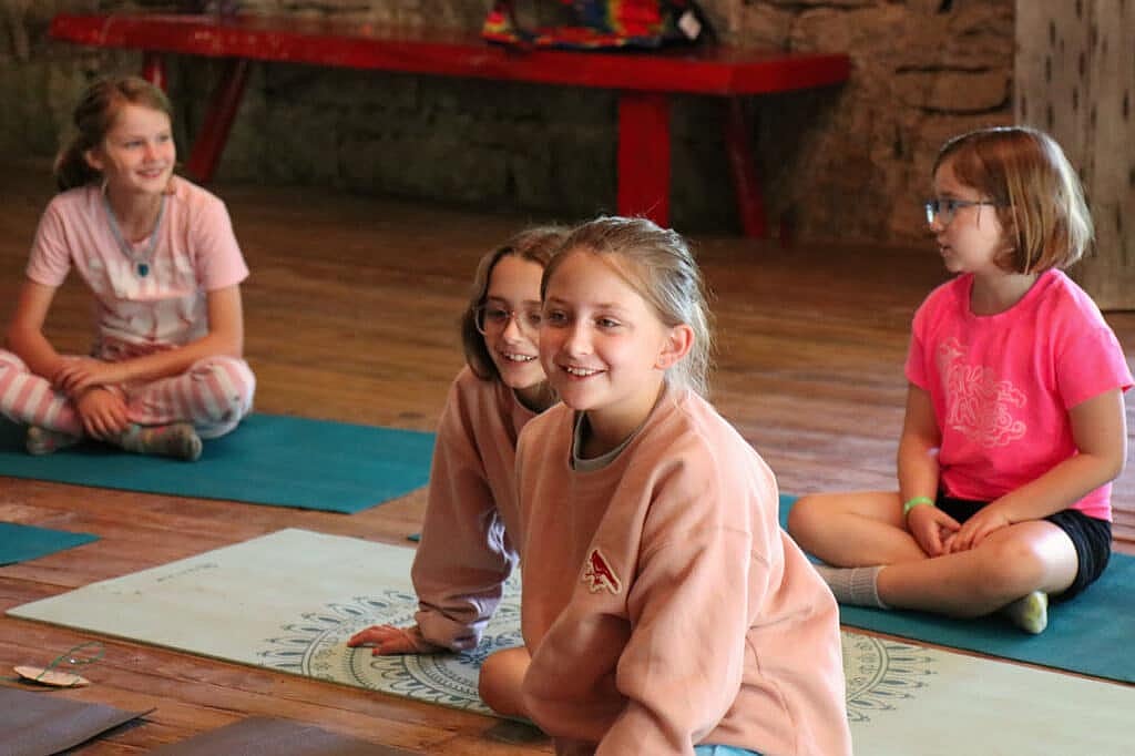 summer camp yoga children laughing