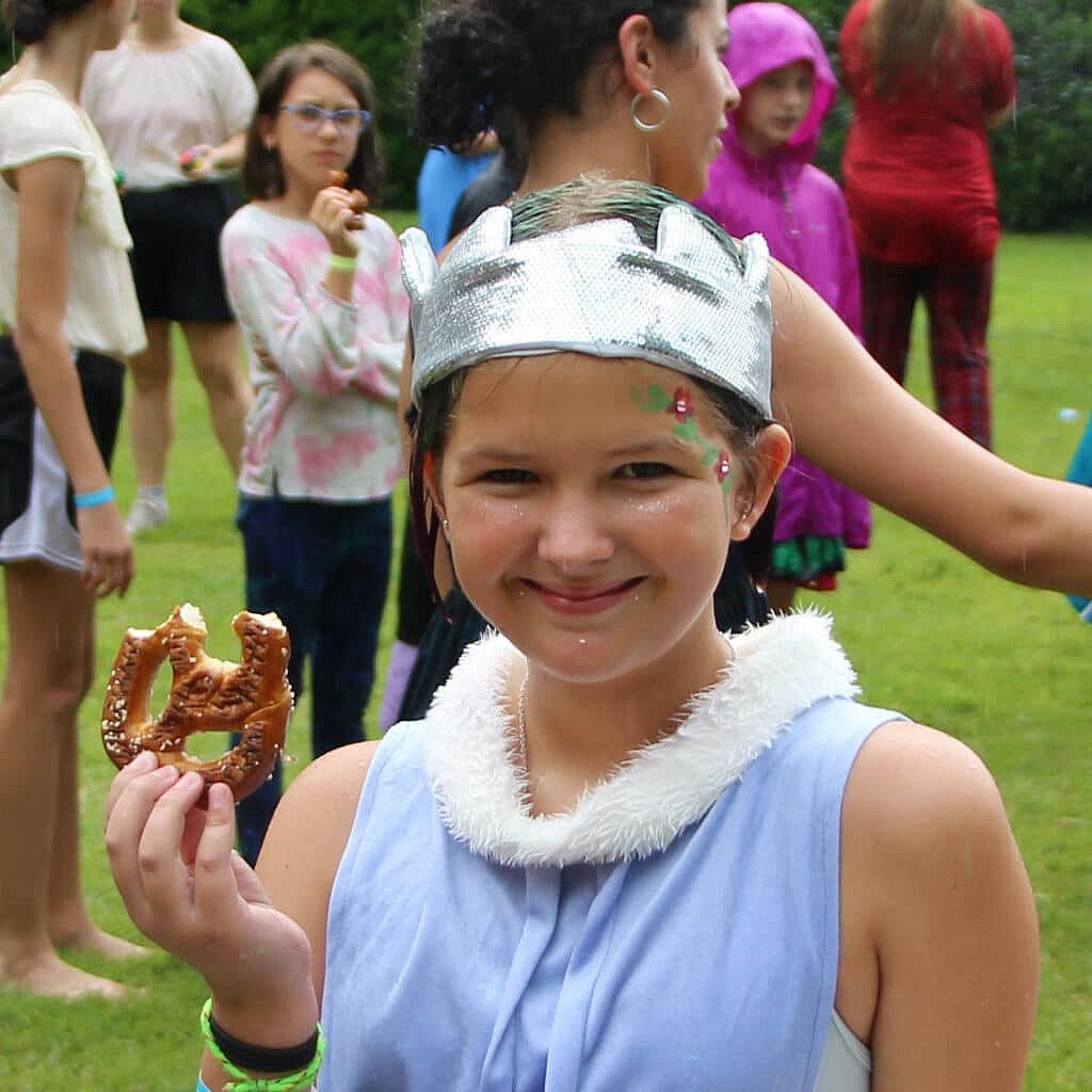 camper girls eating a pretzel