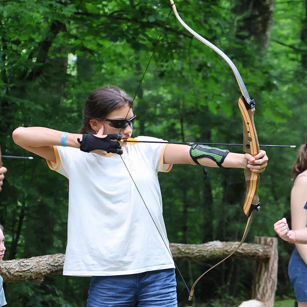 teenager shooting archery