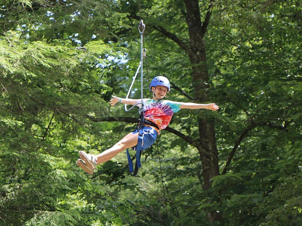 summer camp girl ziplining
