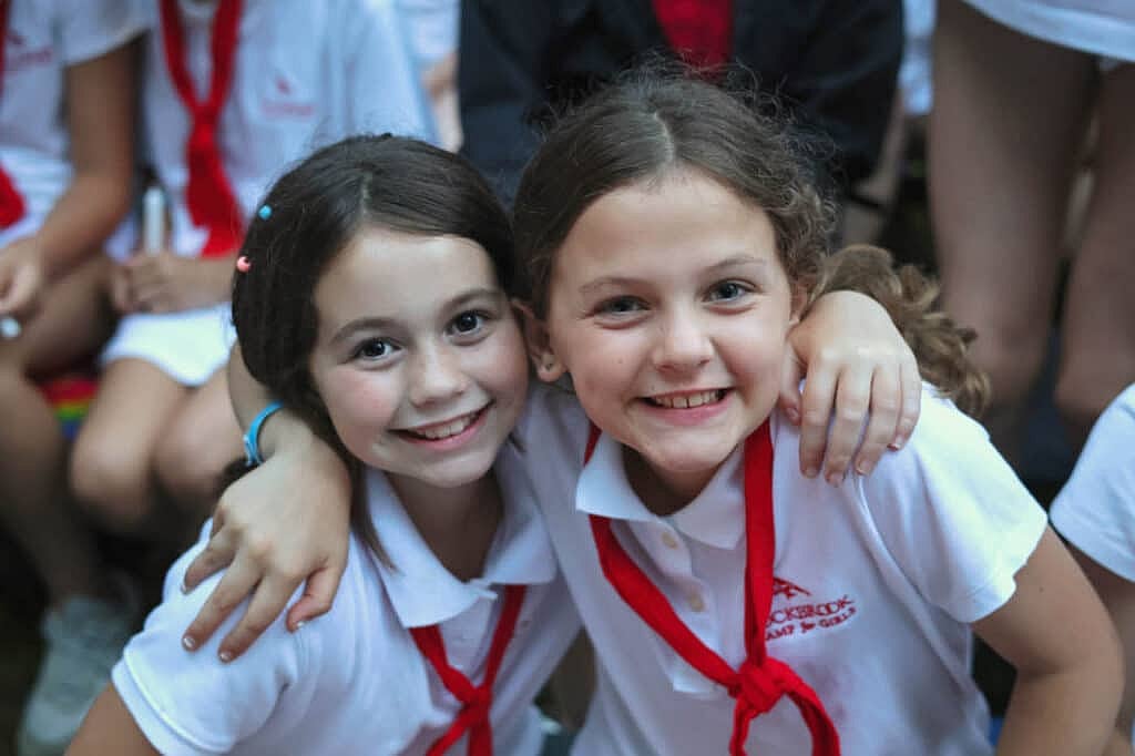 red and white summer camp uniform