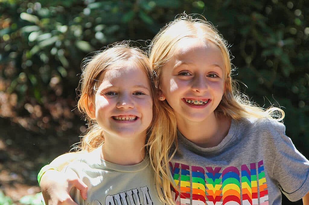 two girls friends at summer camp