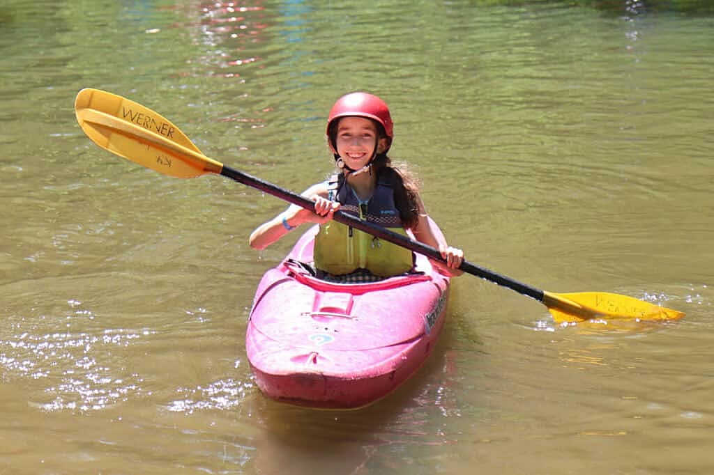 summer camp girl kayaker
