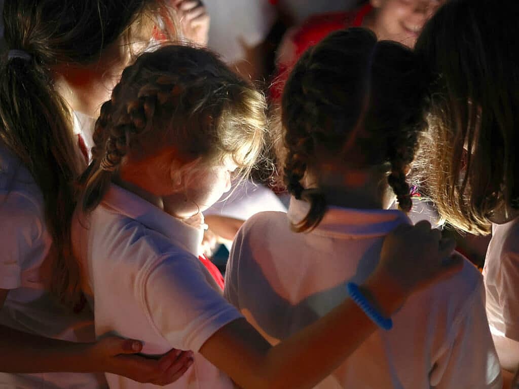 summer camp friends hugging