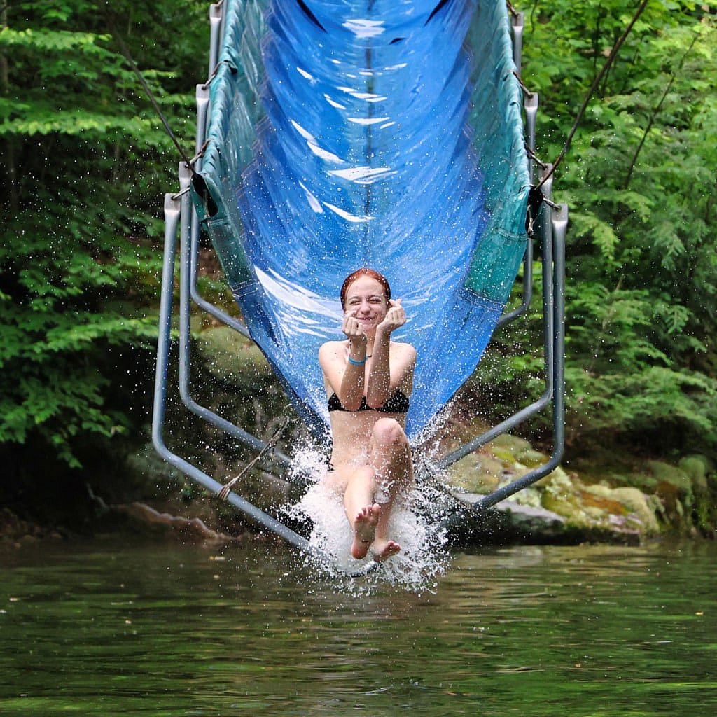 girl riding camp water slide