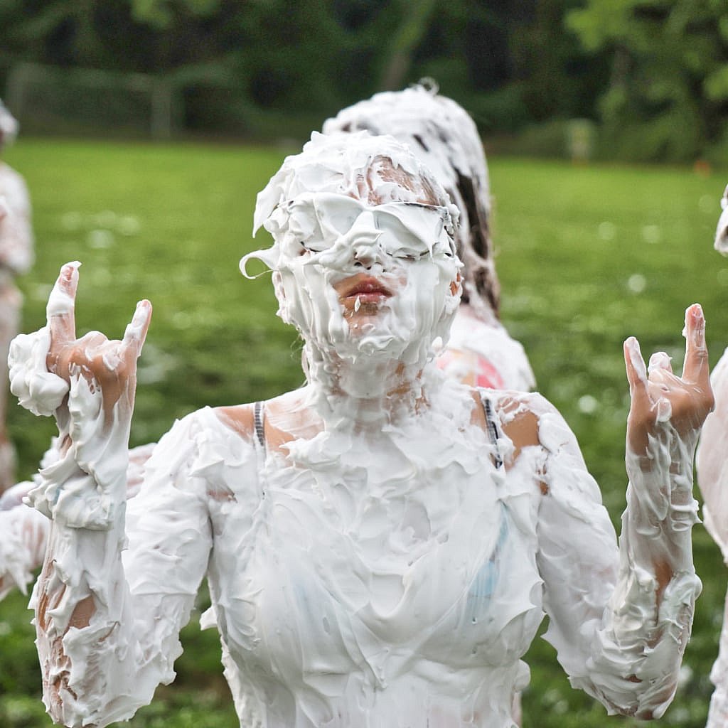 girl completely covered with shaving cream