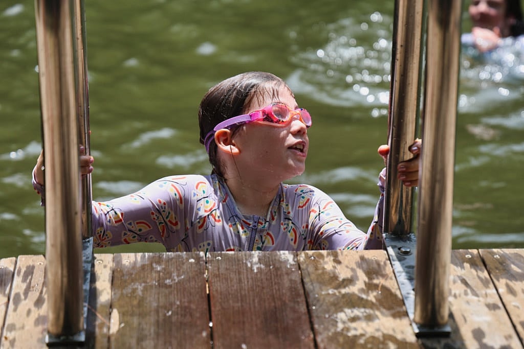 camp swimming lake ladder
