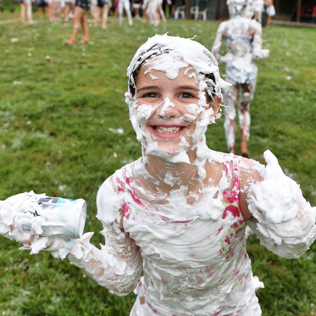 camp girl shaving cream thumbs up