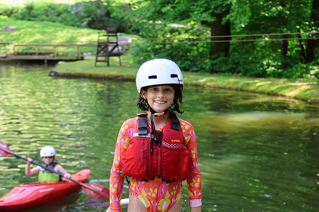young camp kayaking kid