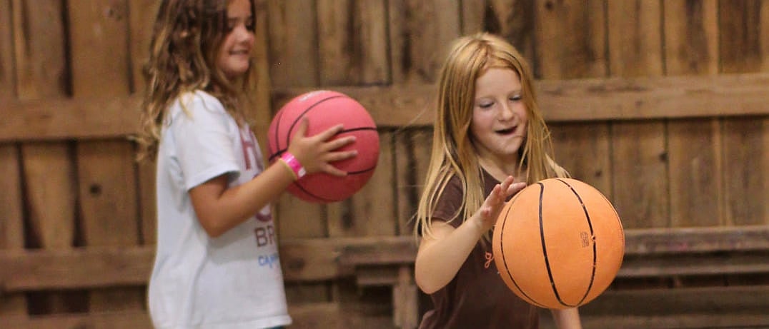 girls at camp play games