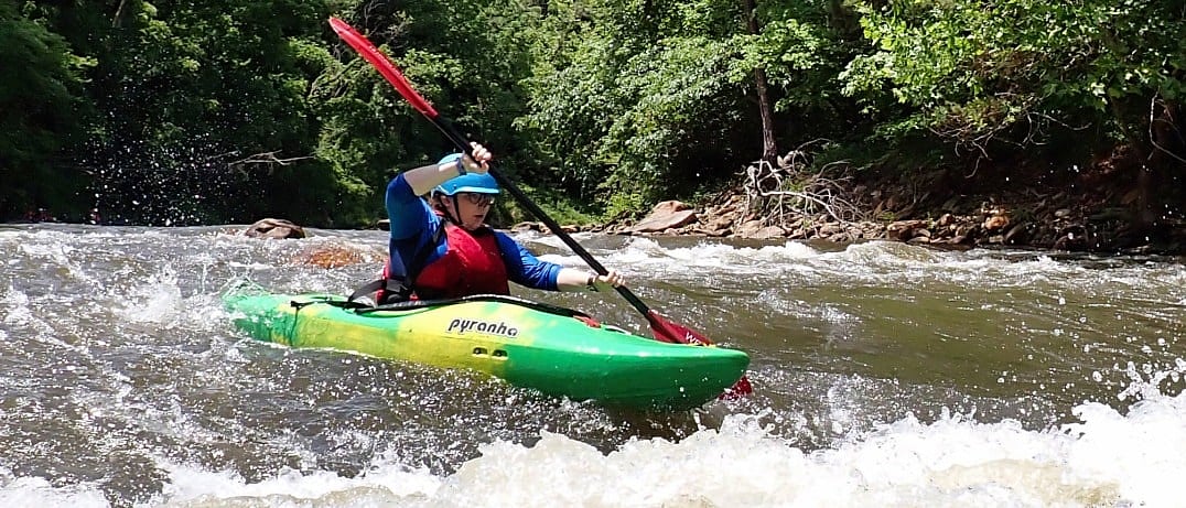 camp girl kayaking