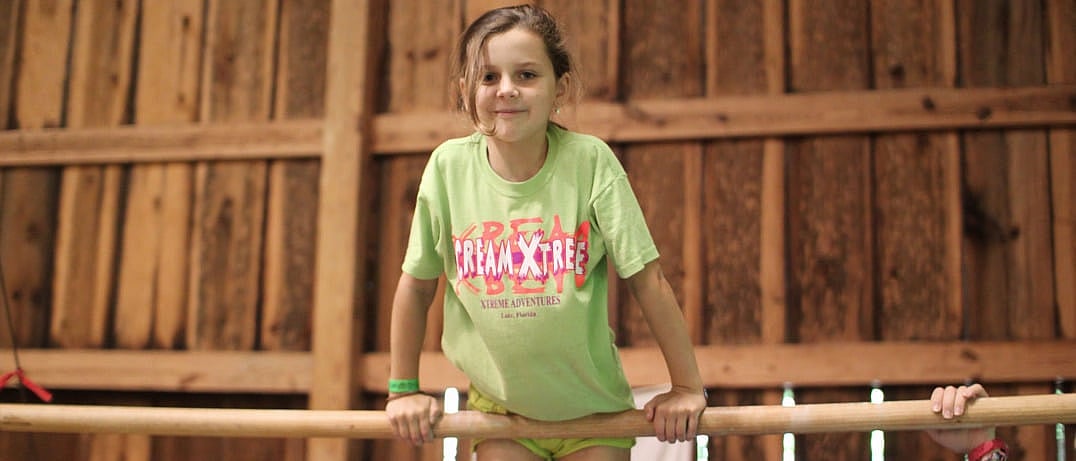 summer camp gymnastics high bar
