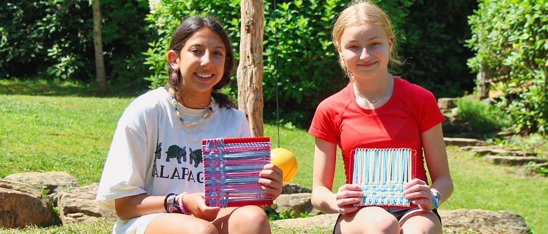 girls outdoor weaving