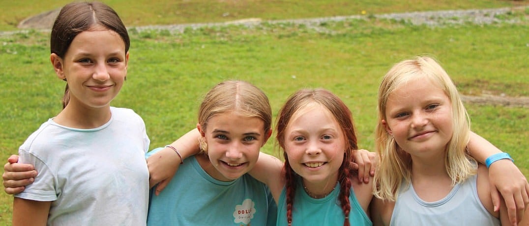 camp girls arm and arm