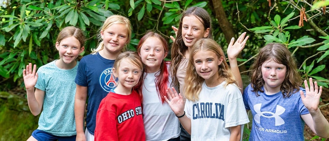 summer camp girls waving