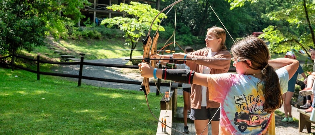 girl shooting archery