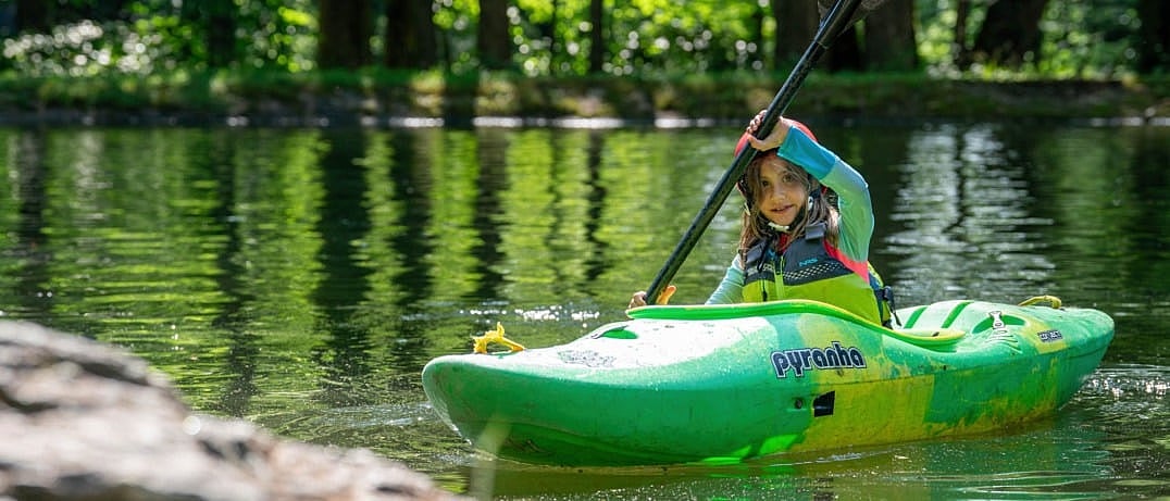 tiny girl kayaking