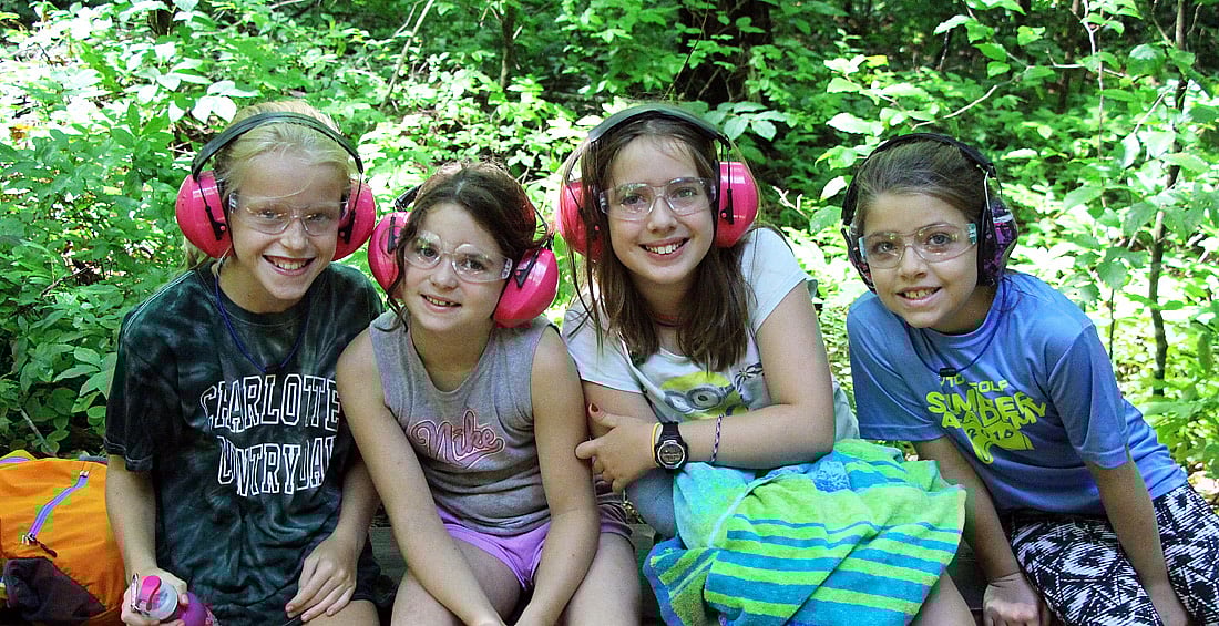 Camp girls with eye and ear protection