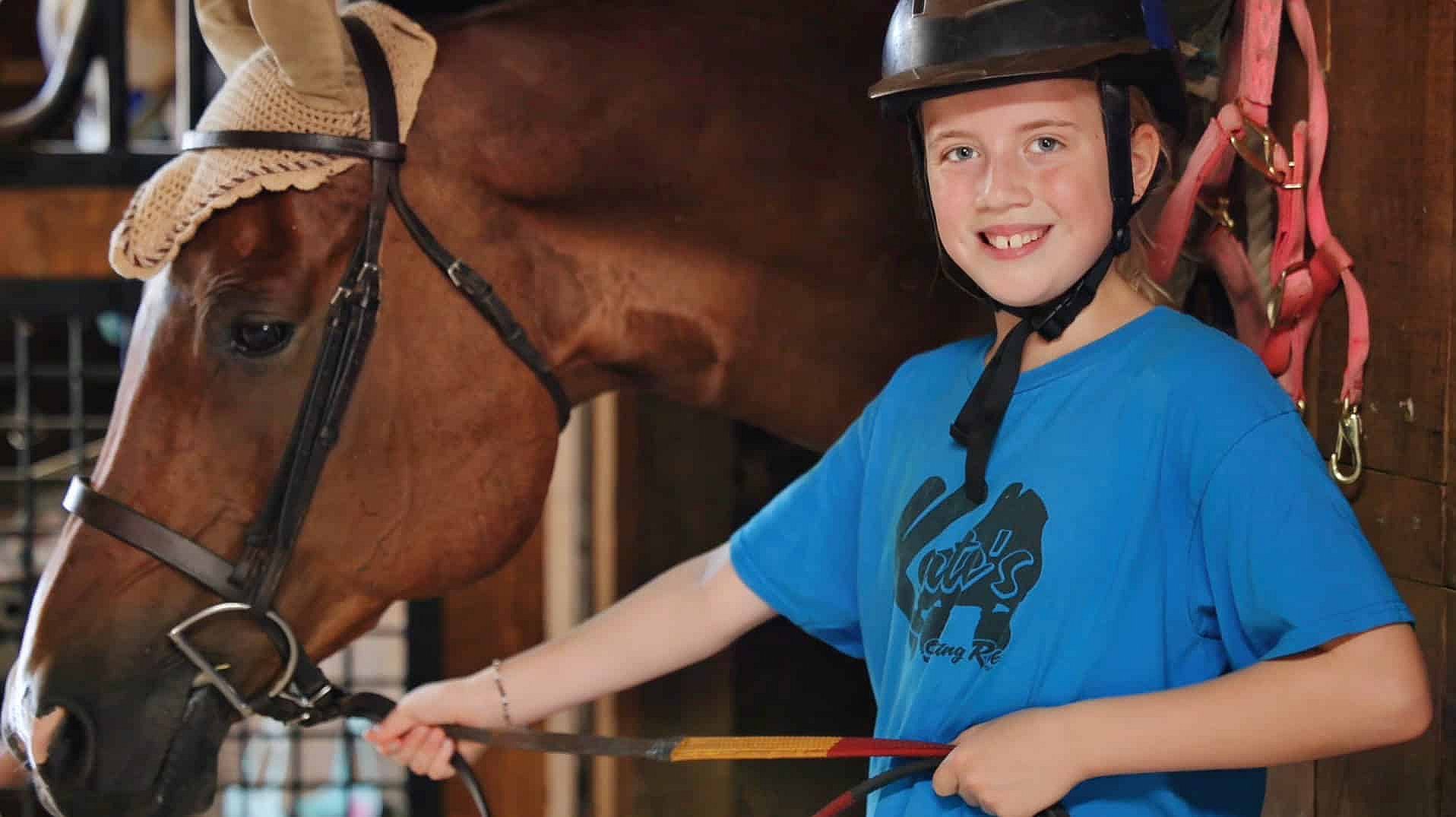 summer camp horse girls smiling