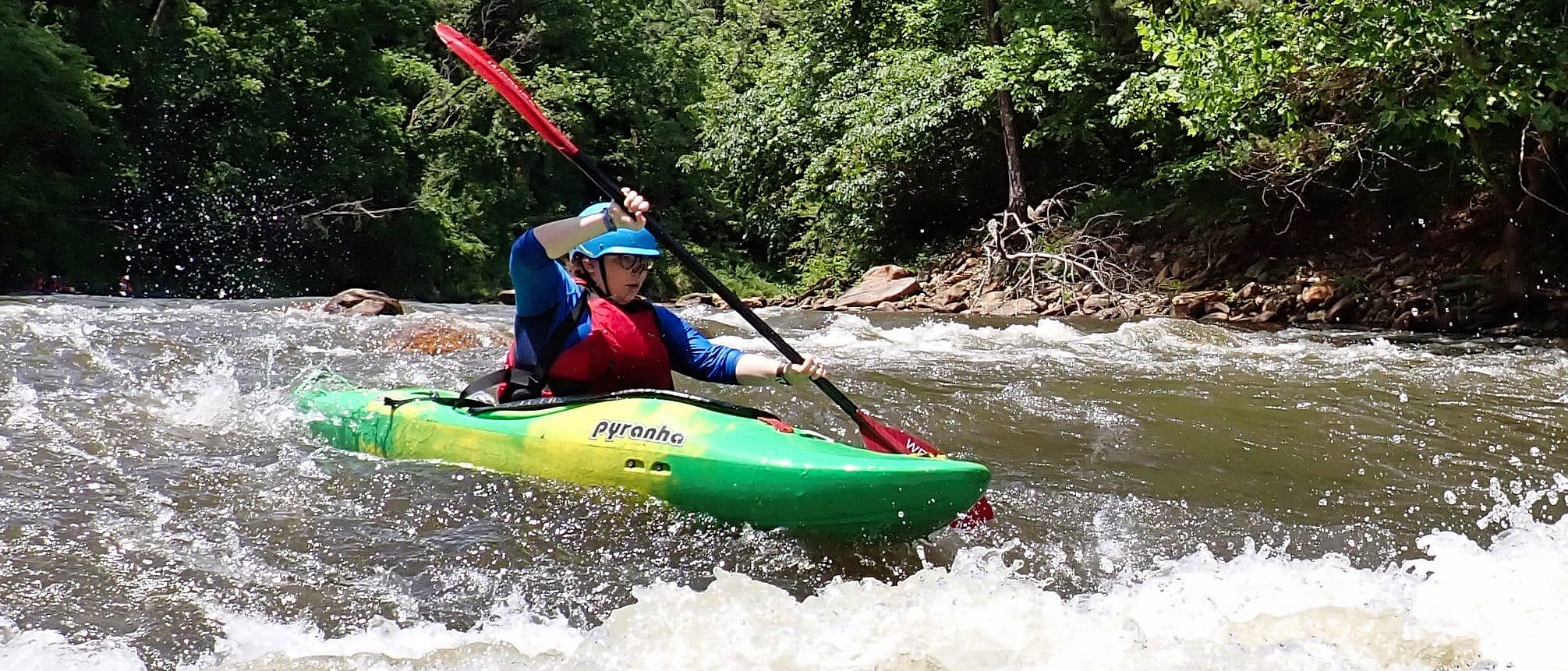 camp girl kayaking