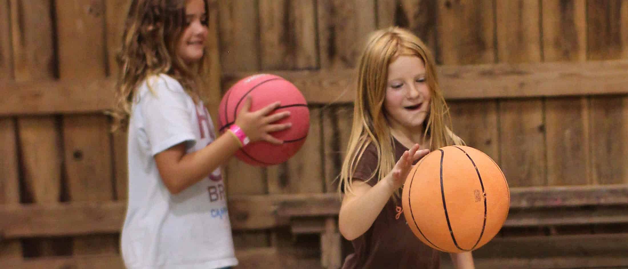 girls at camp play games