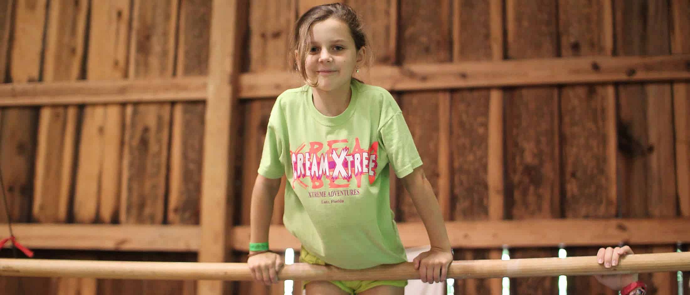 summer camp gymnastics high bar