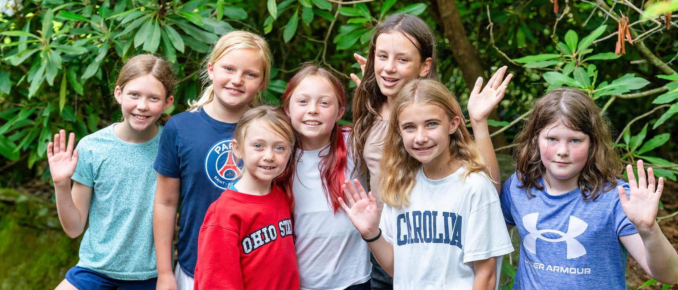 summer camp girls waving