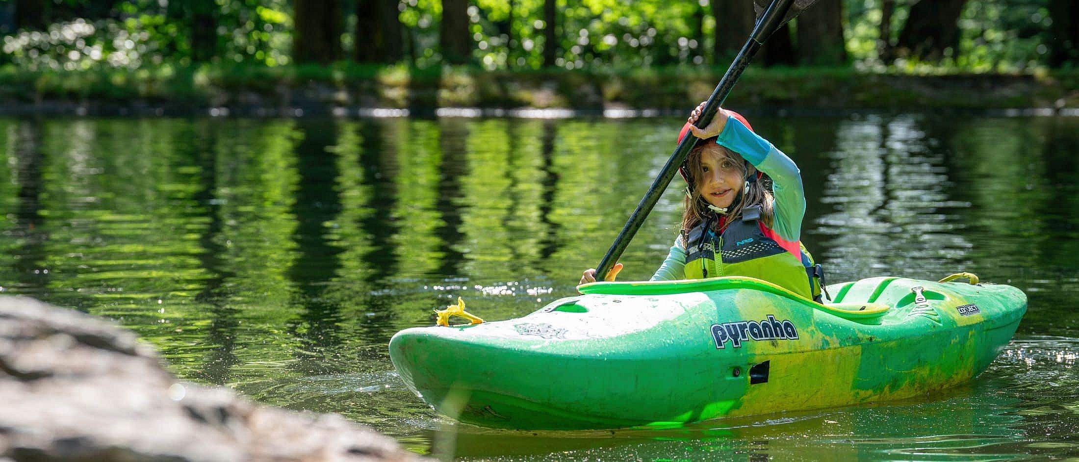 tiny girl kayaking