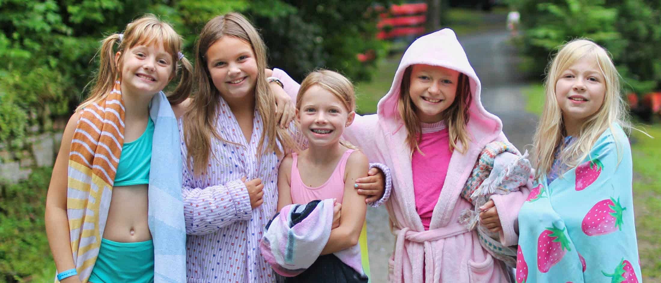 camp rockbrook girls on the way to swim