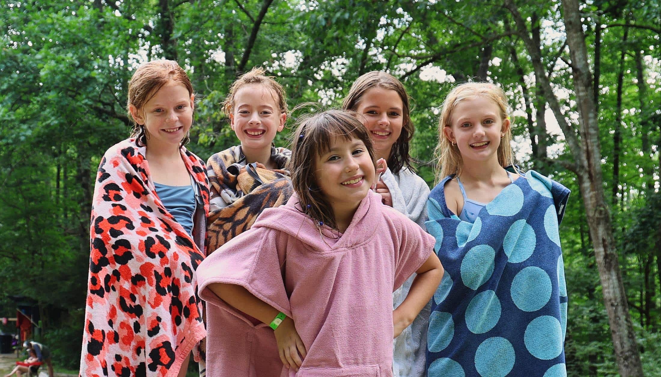 summer camp kids wrapped in towels