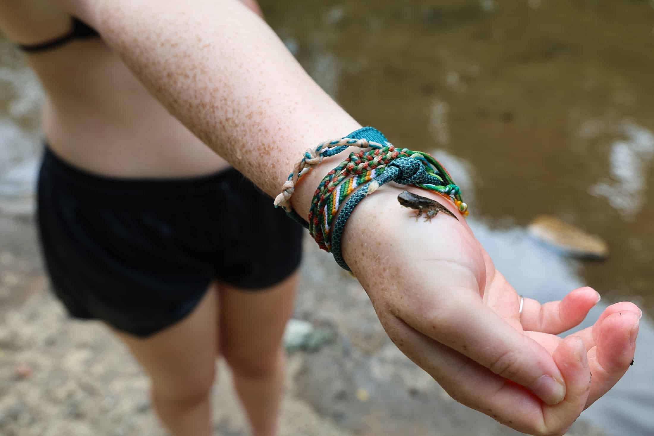 tadpole ona girl's arm