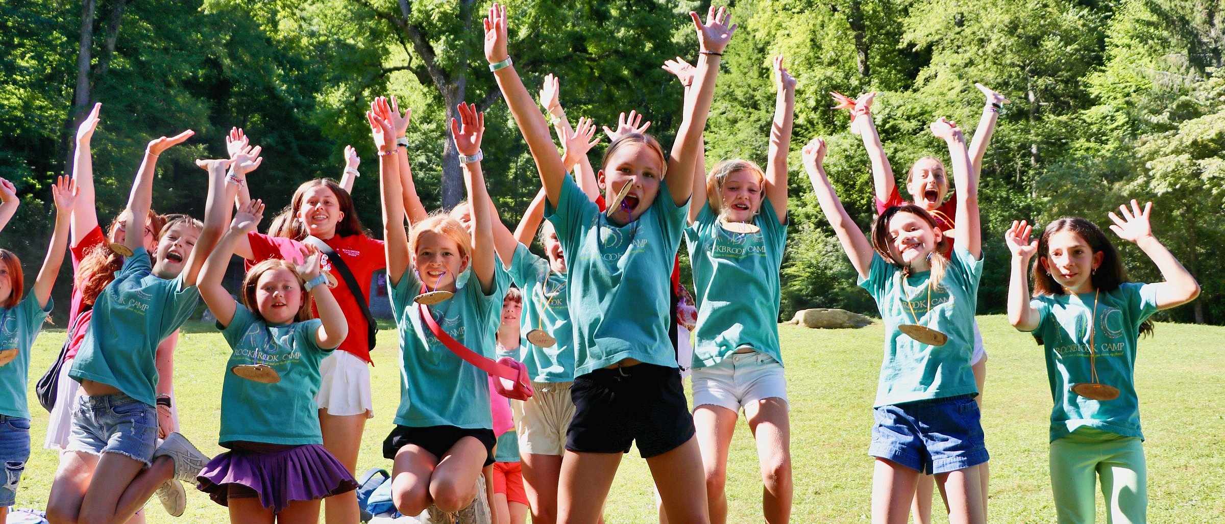 Excited campers arriving at camp