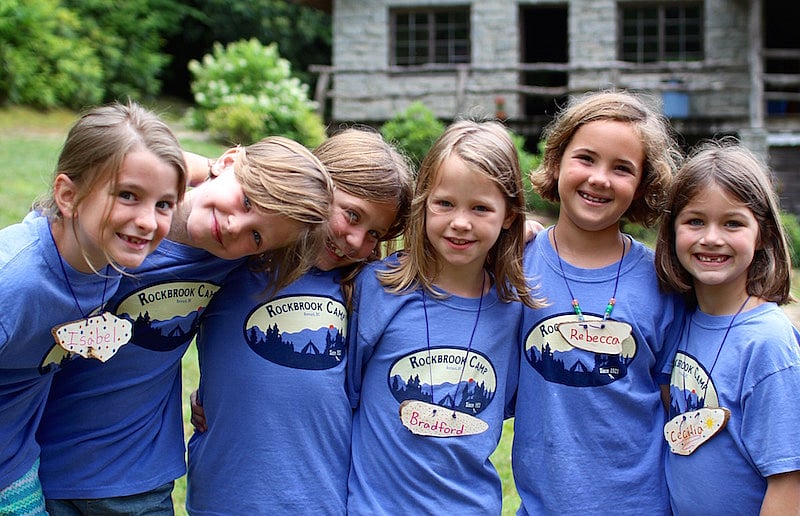 Young girls camp friends