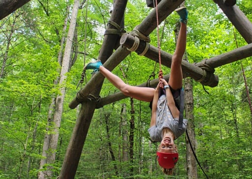climber descending upside down