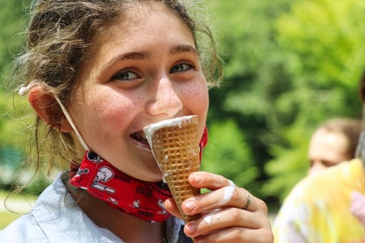 girl eating ice cream cone