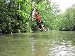 Rope Swing girl at camp