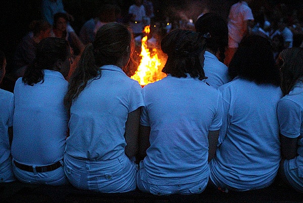 Campfire girls dressed in white