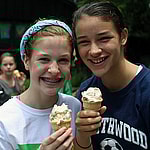 Friends at summer camp eating ice cream