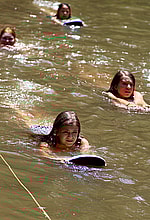 Kids swimming class in lake