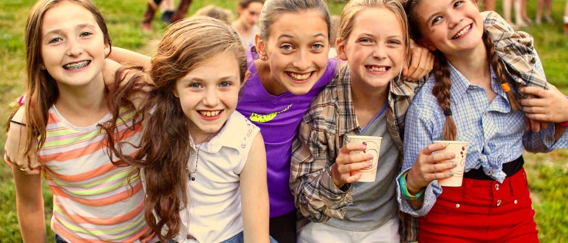 camp girls relaxed outside