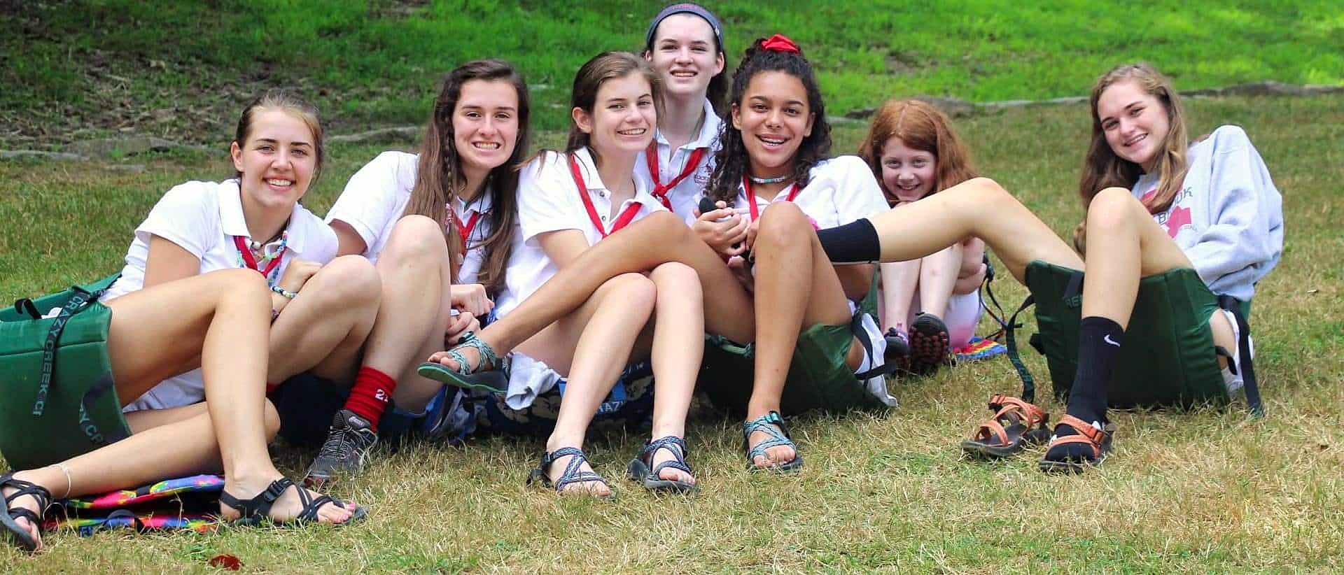 seated group of campers and counselors