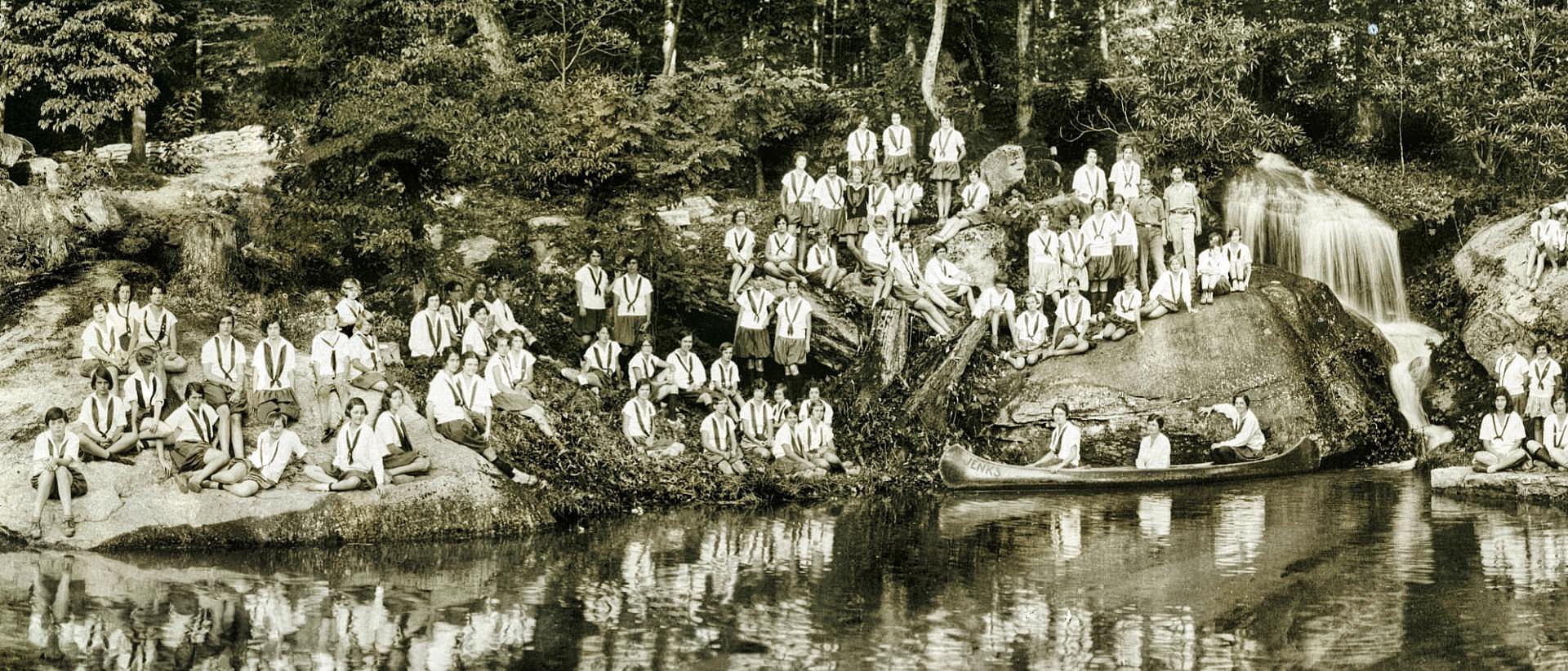 Mrs. Nancy Carrier sitting in canoe on rockbrook lake