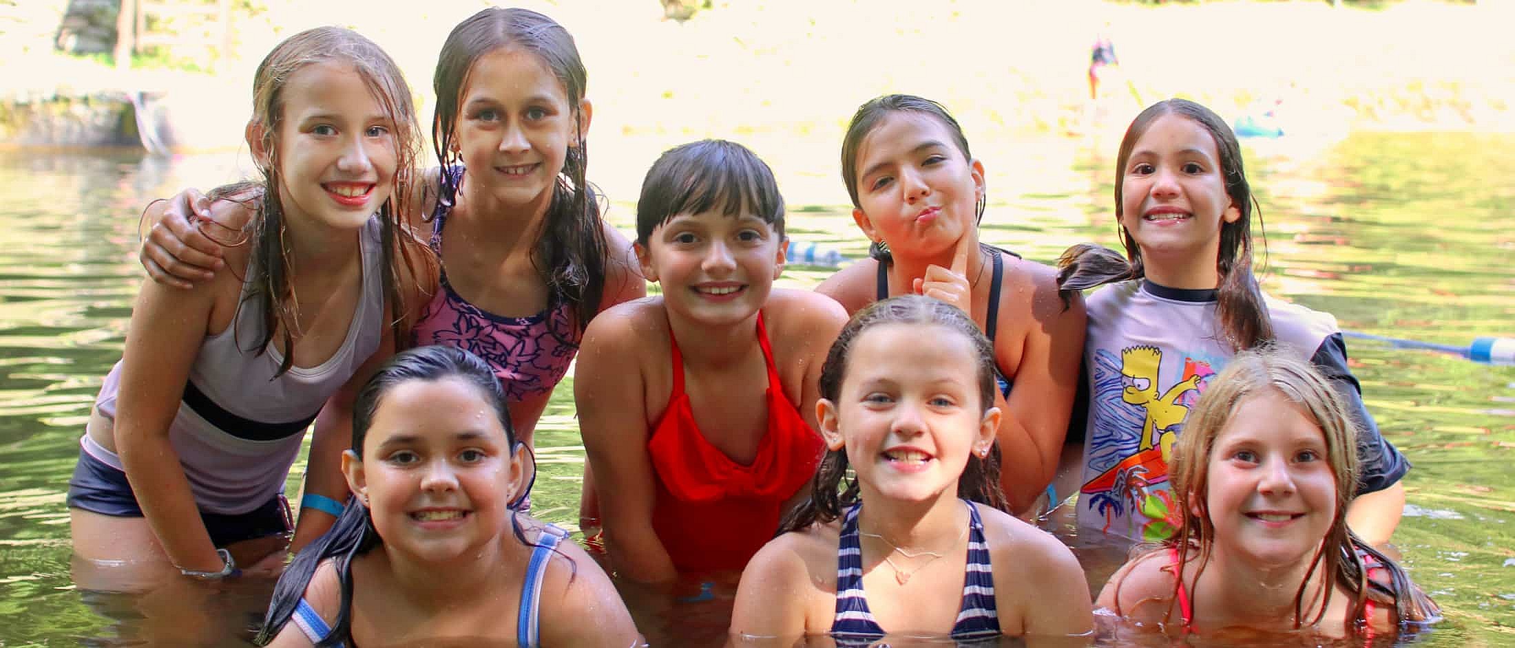 rockbrook camp kids together in lake