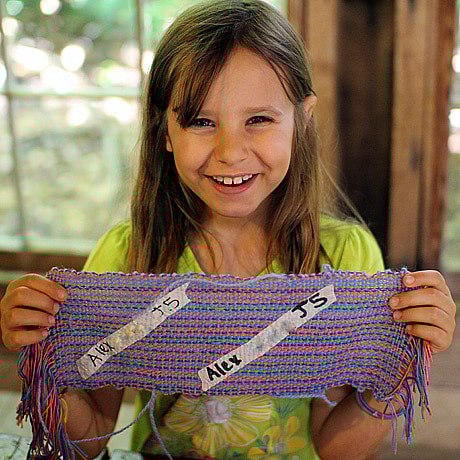 kid weaving pride